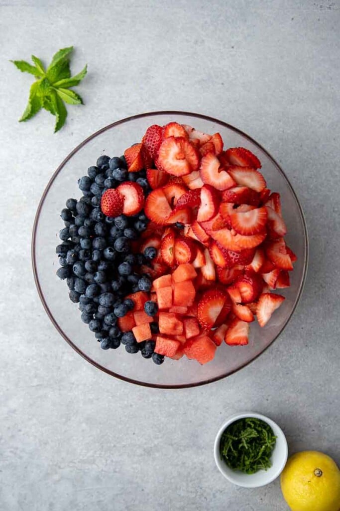 Watermelon, strawberries, and blueberries in a bowl