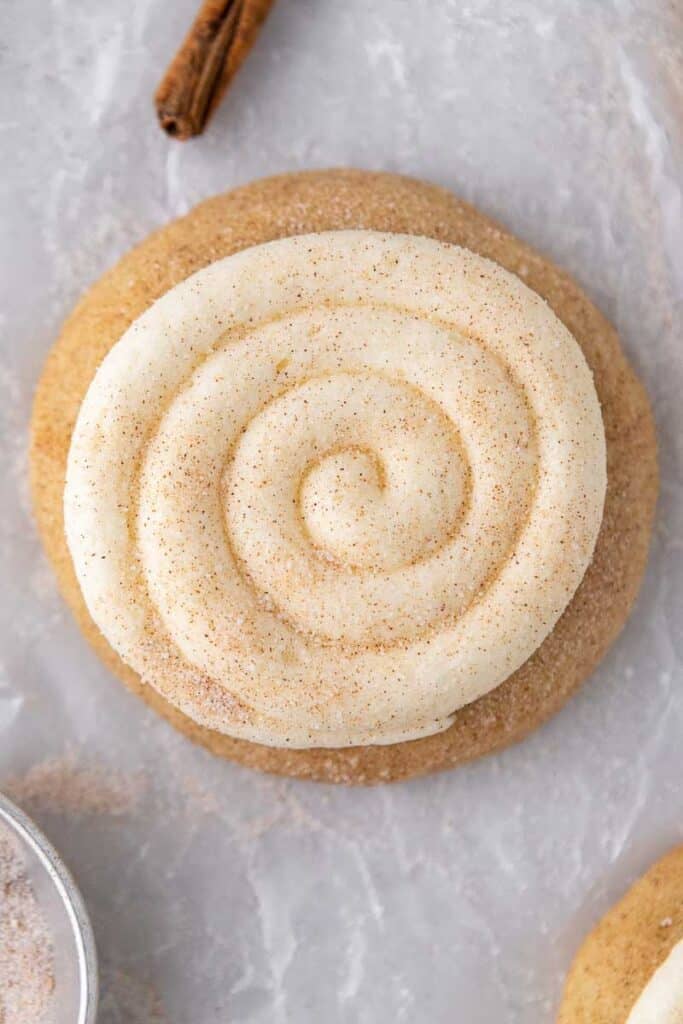 Close up overhead shot of cream cheese swirls on cookie