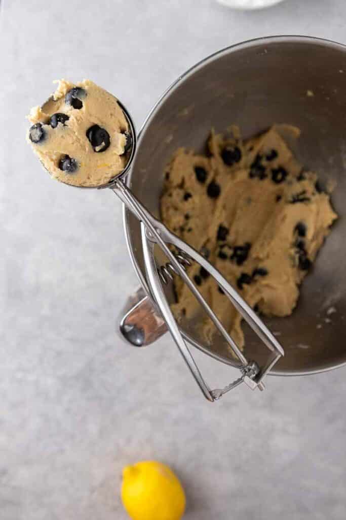 Blueberry cookie dough in a cookie scooper
