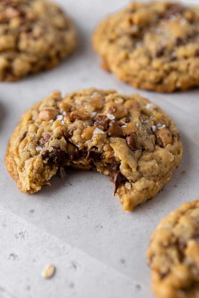 Crumbl mom's recipe cookie with a bite taken out of it