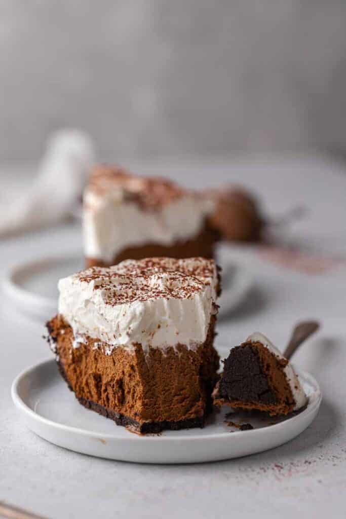 Slice of no bake chocolate pie with a fork