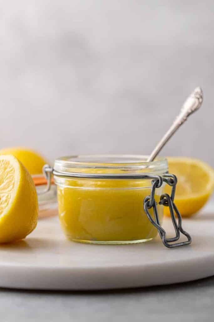 Straight on shot of lemon curd in a jar