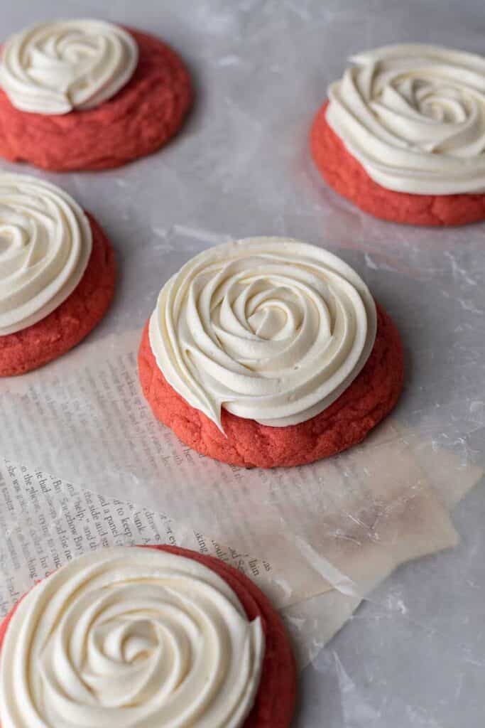 Cream cheese frosted pink velvet cookies