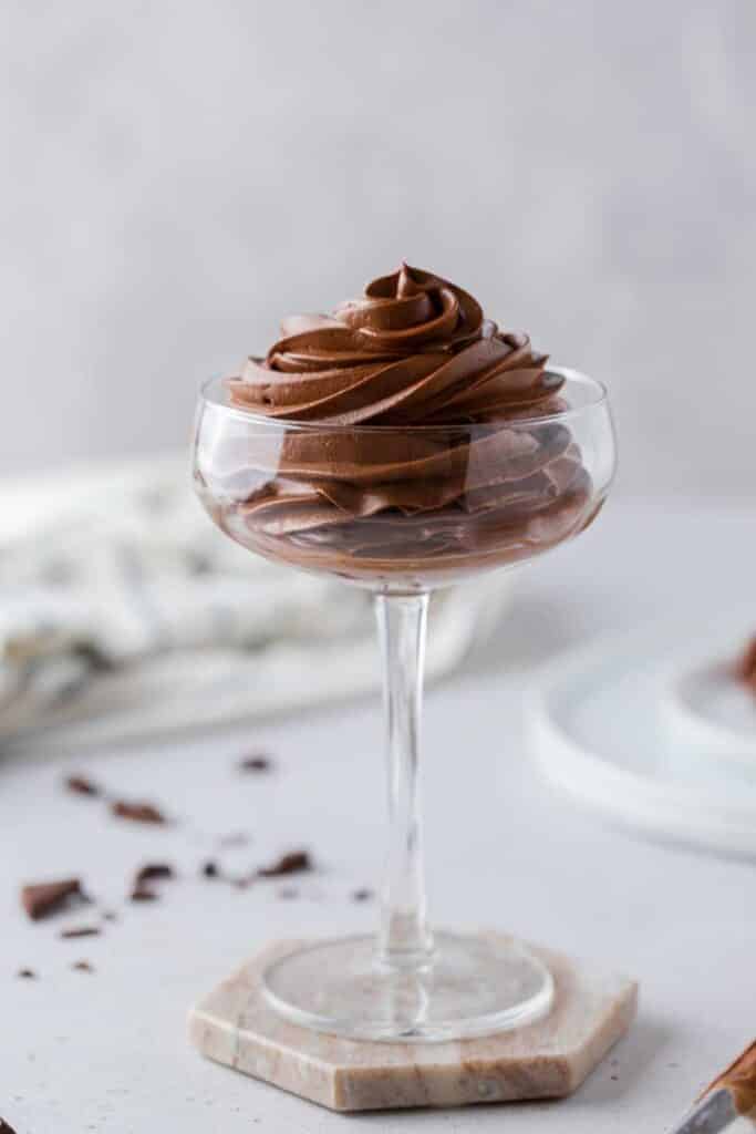 Small batch chocolate Swiss meringue buttercream piped in a tall glass