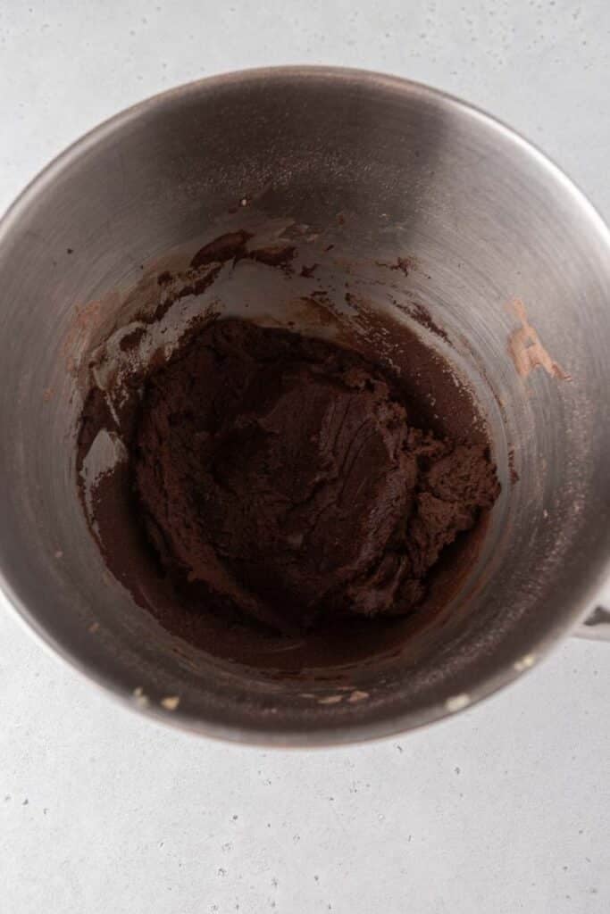 Chocolate cookie dough in mixing bowl