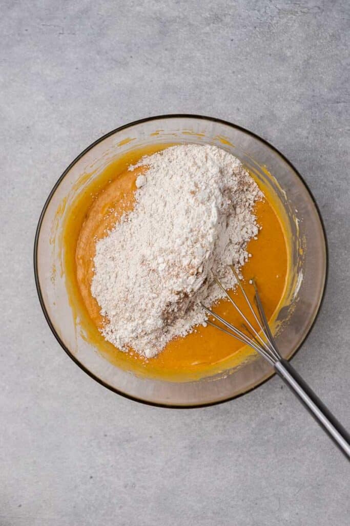 Wet ingredients with flour in a bowl