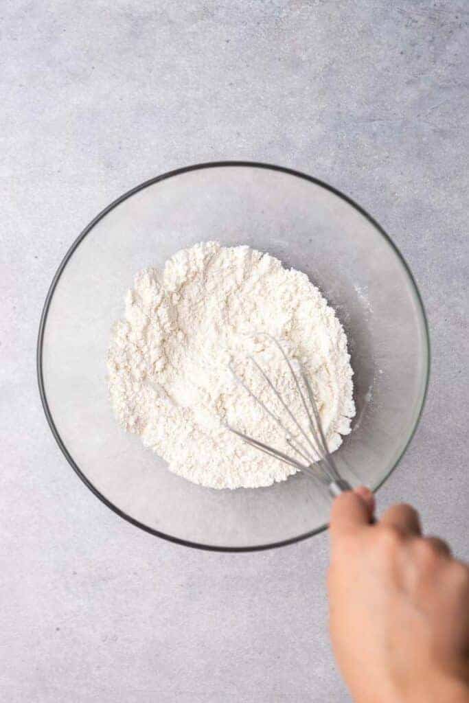 hand whisking dry ingredients