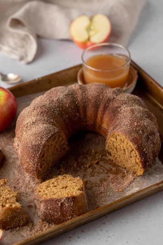 Apple cider bundt cake on baking sheet