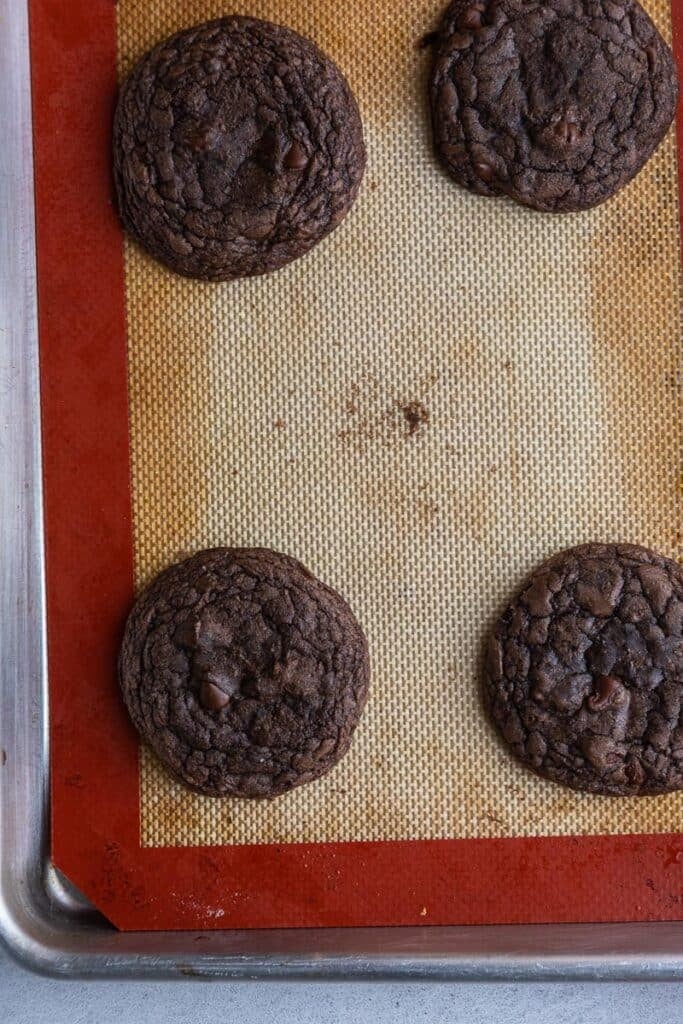Brownie batter cookies on baking sheet