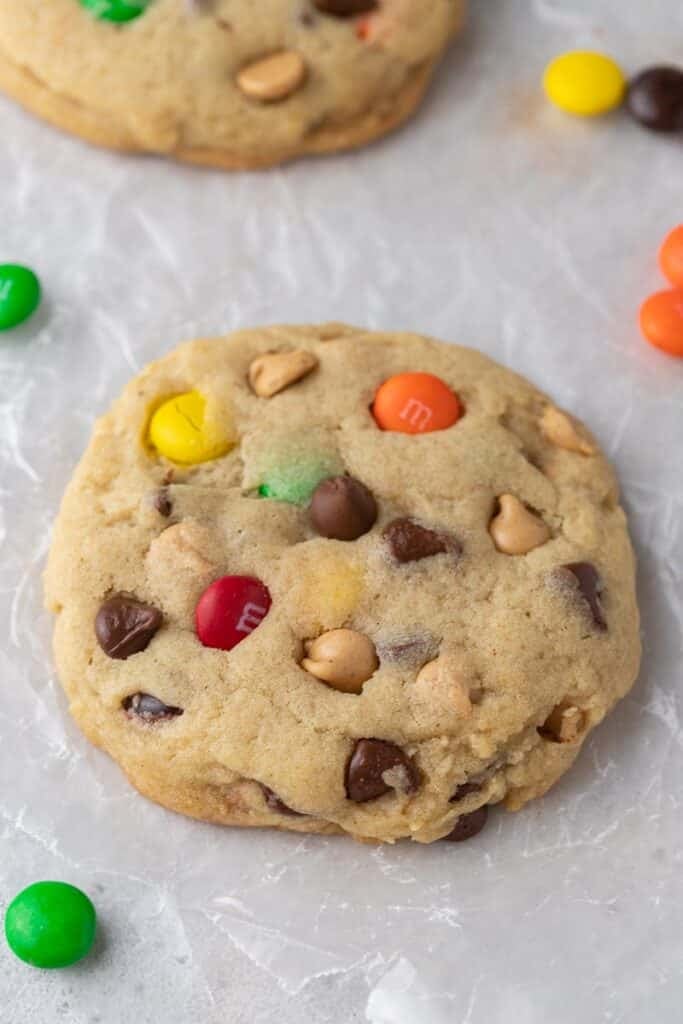 Thick and chewy Monster cookie on parchment paper