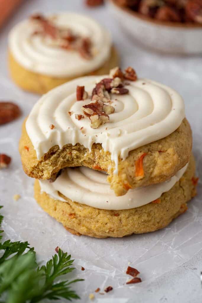 Carrot cake cookie with a bite taken out of it