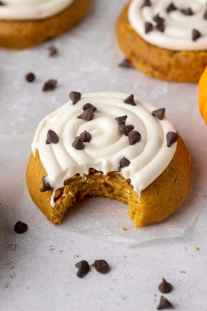 Thick crumbl cookie pumpkin cookies with cream cheese frosting