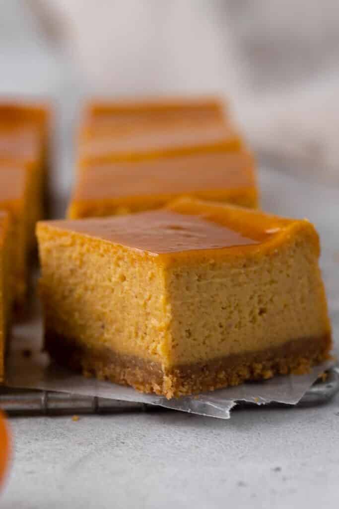Cheesecake bars with caramel on top