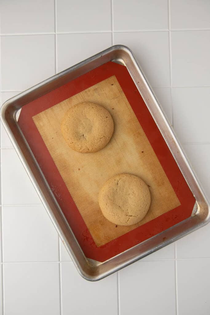 Baked thick cookies on baking sheet