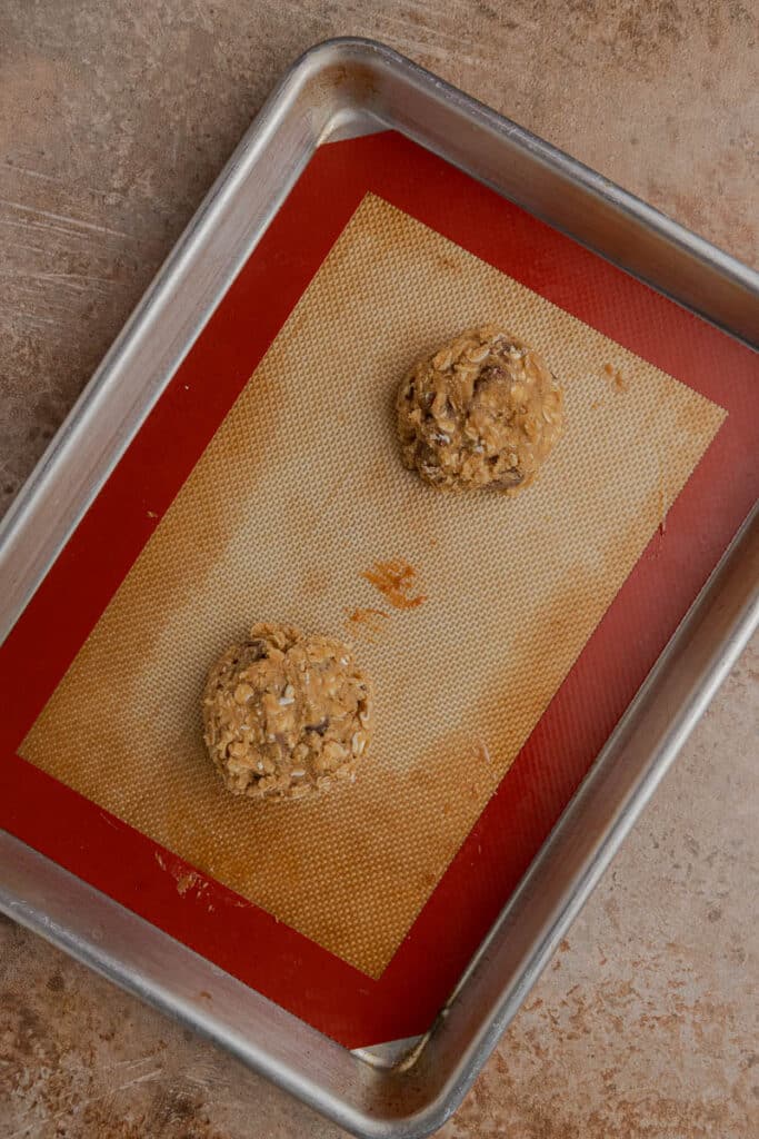 Oatmeal cookie dough on baking sheet