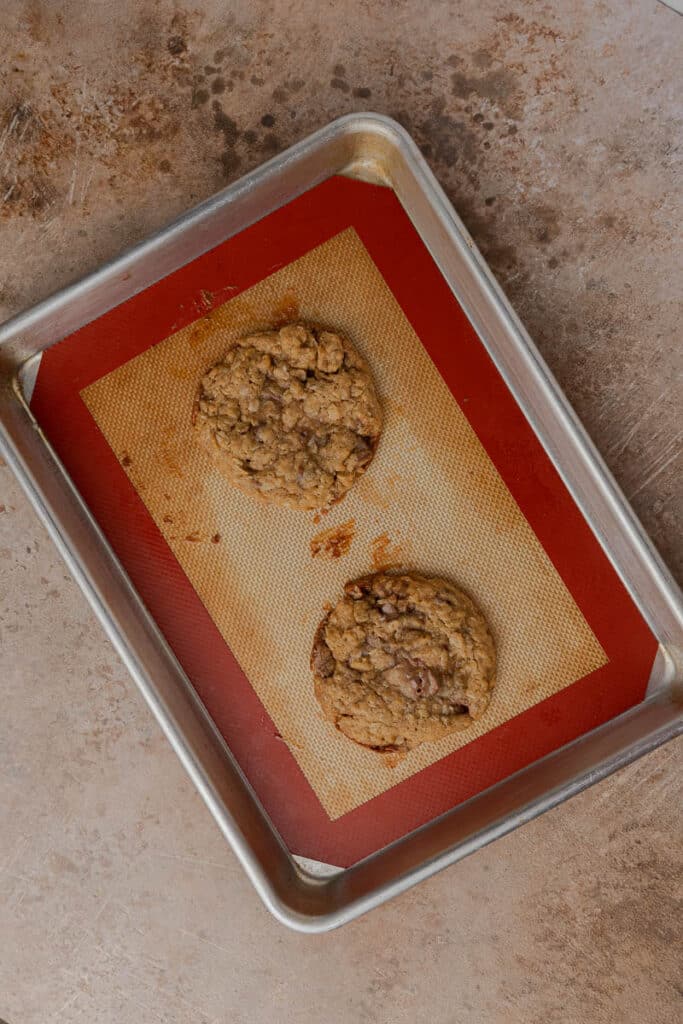 Oatmeal caramel cookies on baking sheet