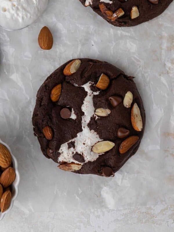 Overhead shot of chocolate cookie with almond and chocolate chips