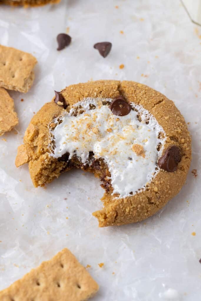 Crumbl s'mores cookies with a bite taken out of it