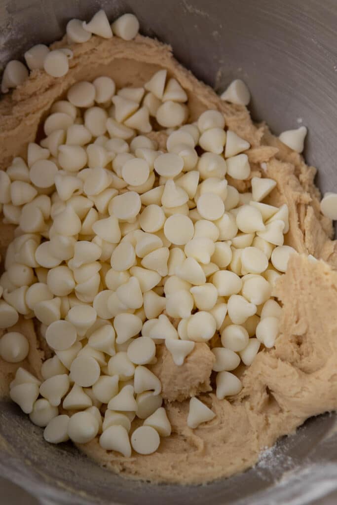 White chocolate chip cookie dough in mixing bowl