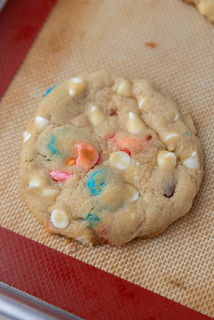 Crumbl lucky charms cookie in a baking sheet