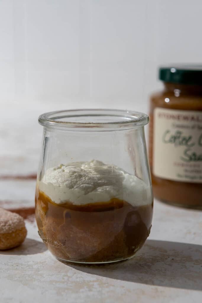 Ladyfingers soaked in coffee caramel and mascarpone cream  in a cup