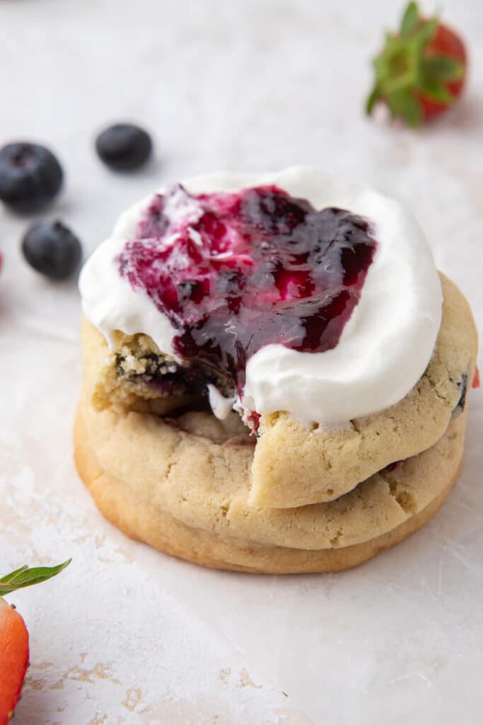 Berries and cream cookies on top of each other