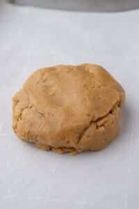 peanut butter cookie dough on baking sheet