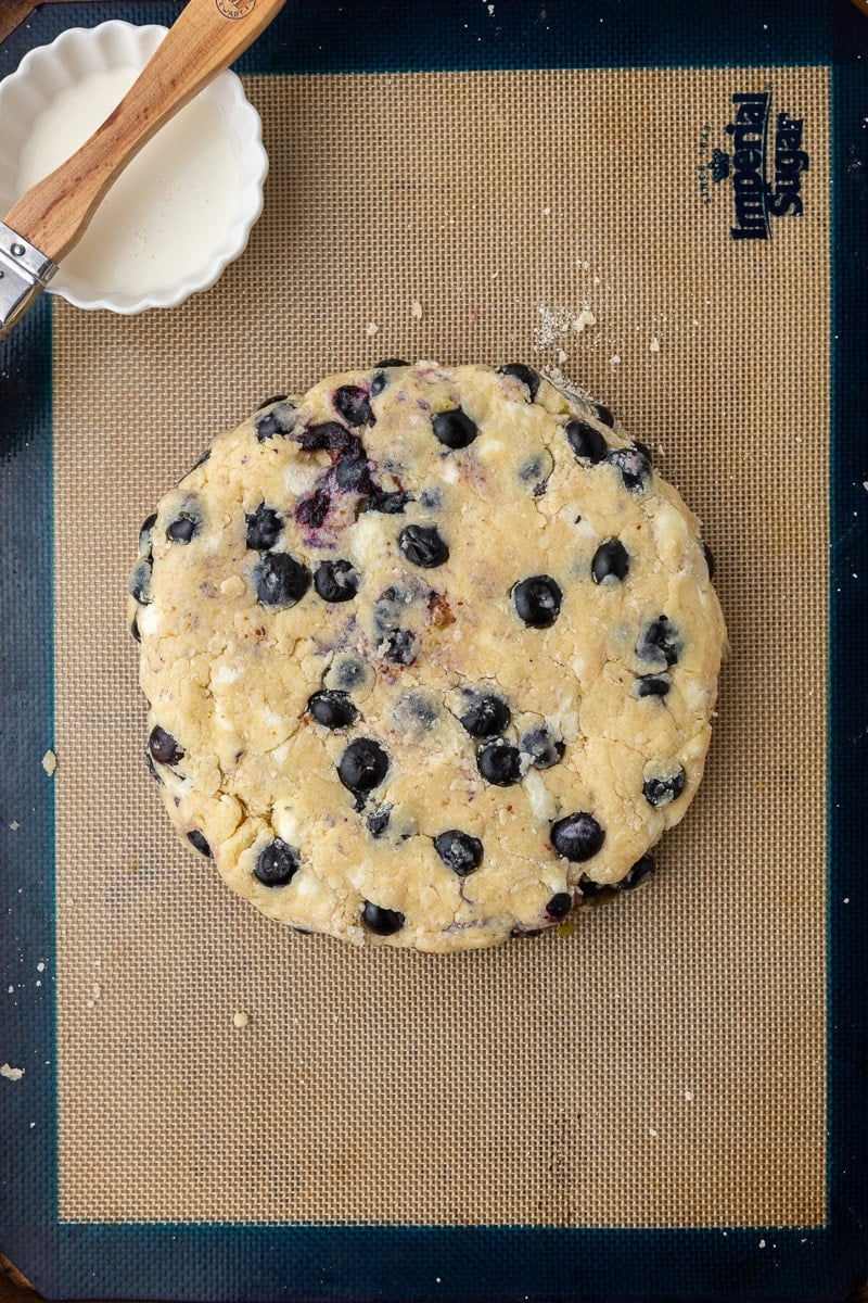 Blueberry scones dough on baking sheet
