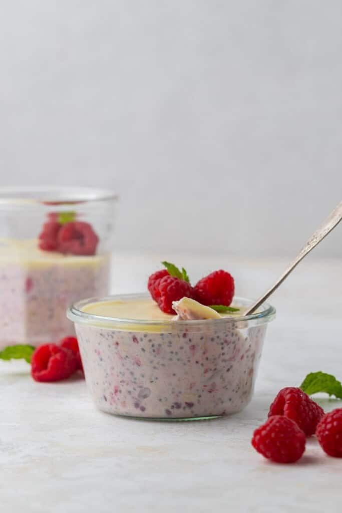 Pink overnight oats in a cup