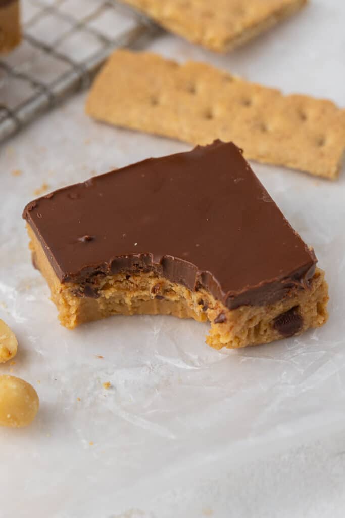 No bake peanut butter bar with a bite taken out of it