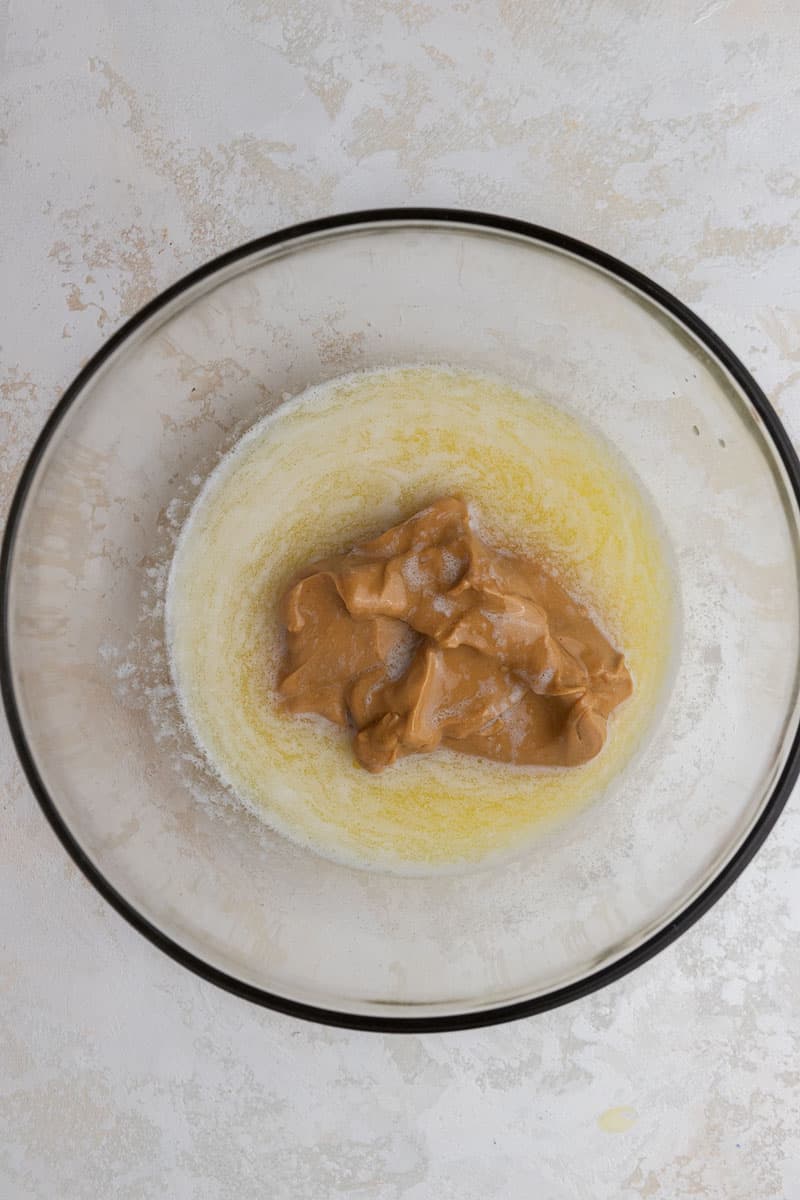 Melted peanut butter and butter in bowl