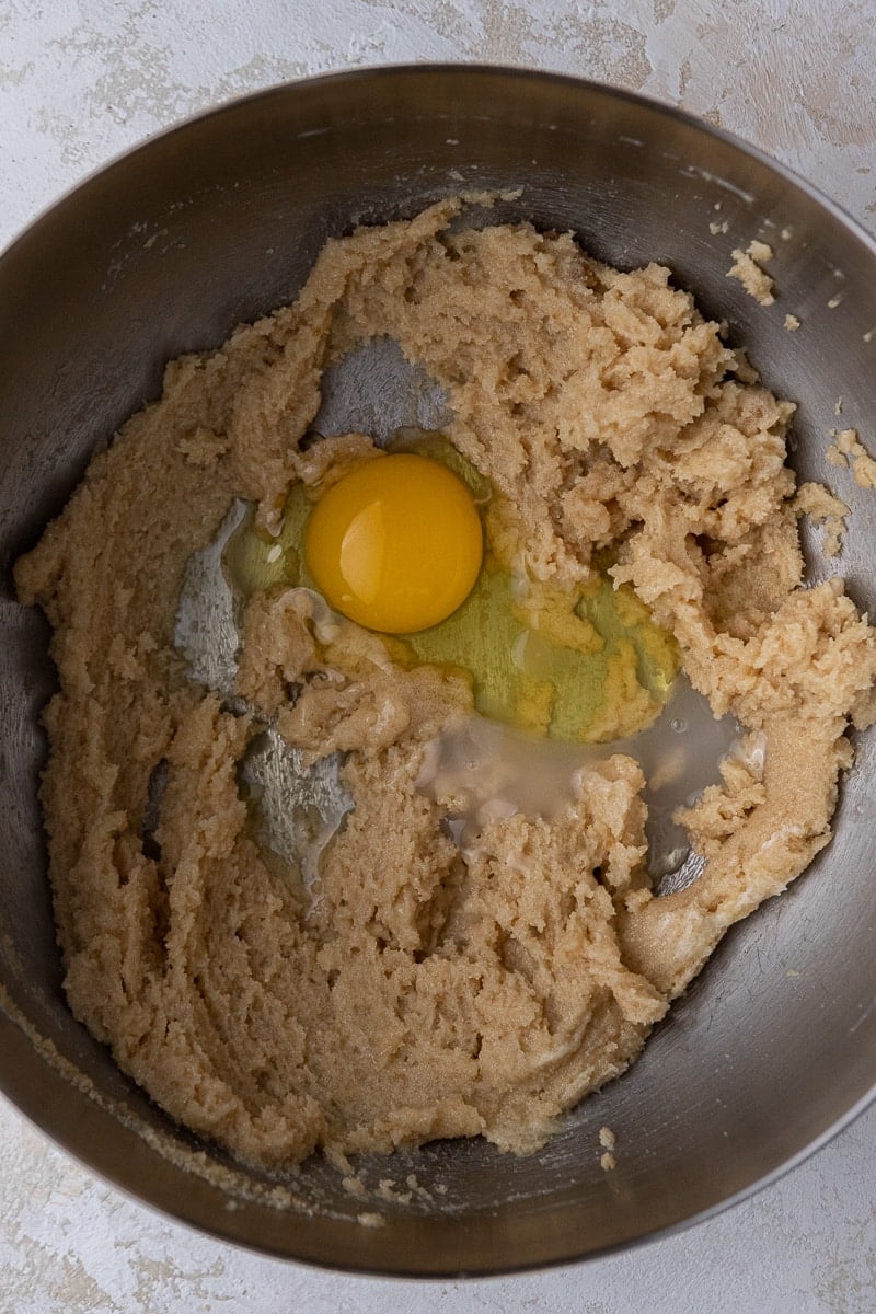 Eggs and creamed butter in mixing bowl 