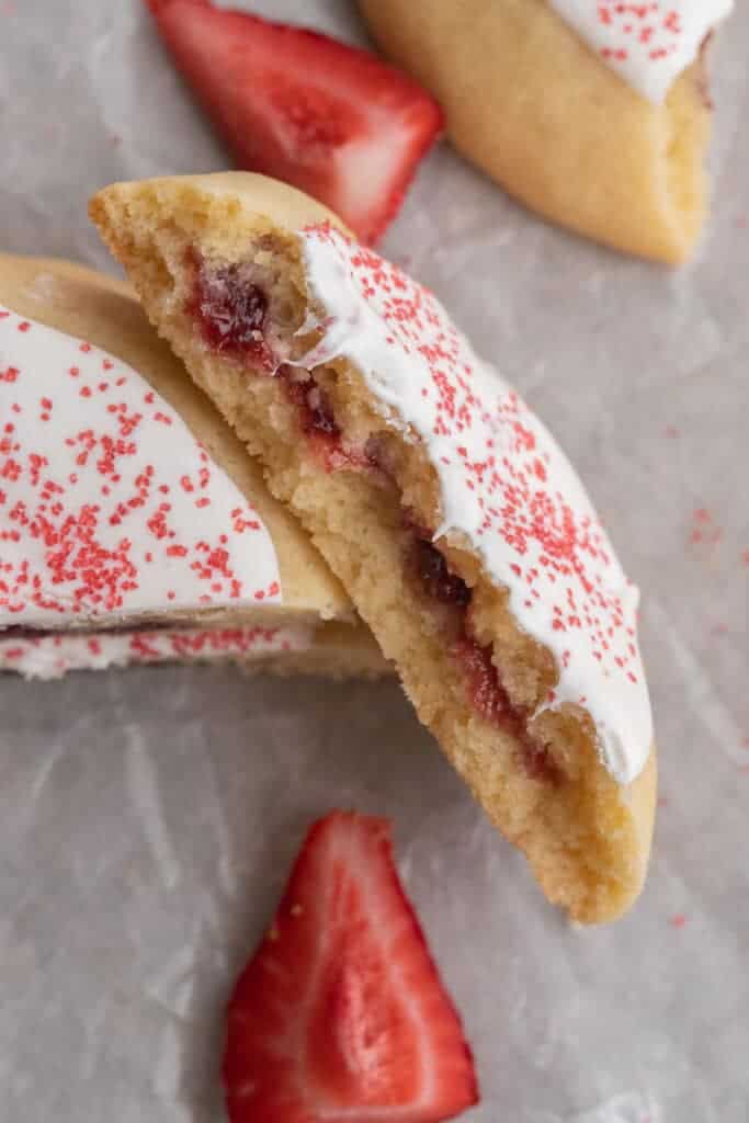 Overhead shot of strawberry pop tart broken in half