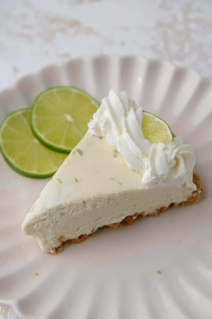 Slic eof no bake key lime pie on a plate