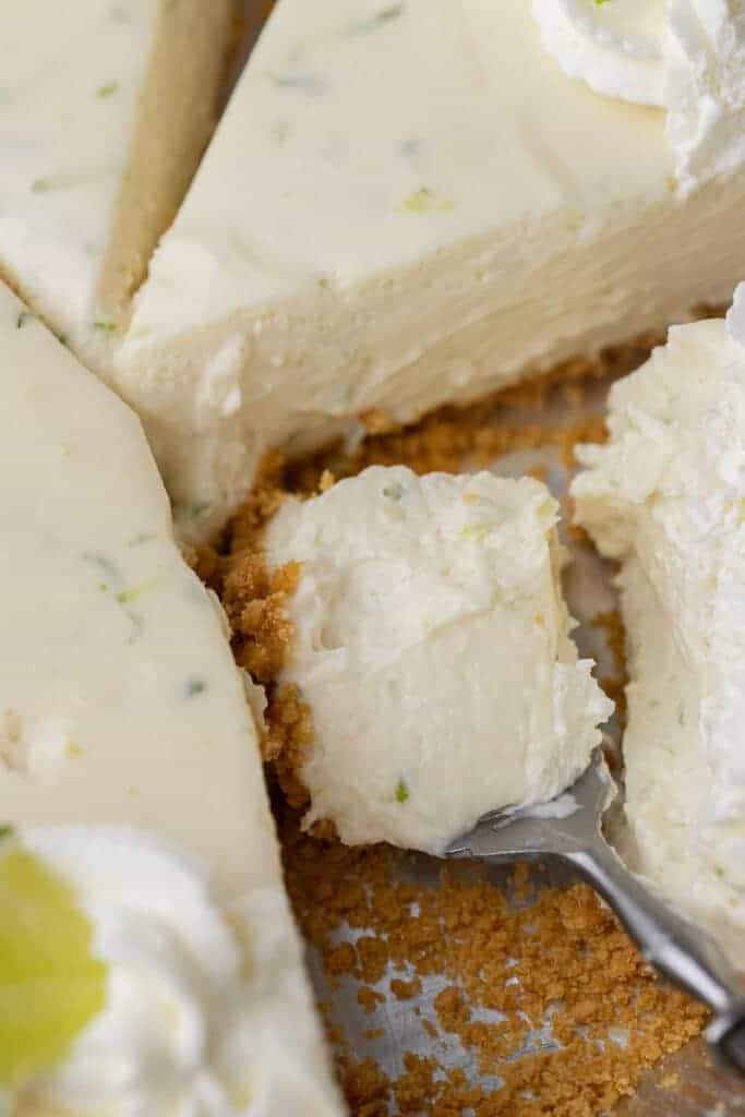 Close up of a forkful of key lime pie