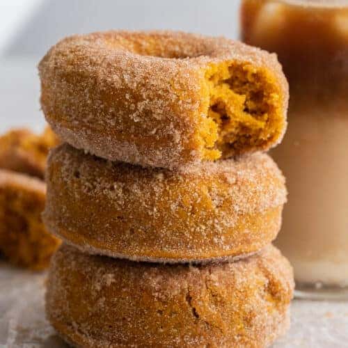 Close up of pumpkin spice donuts stacked