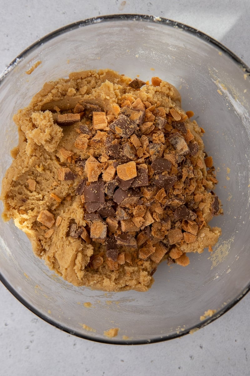 Peanut butter butterfinger cookie dough in a bowl