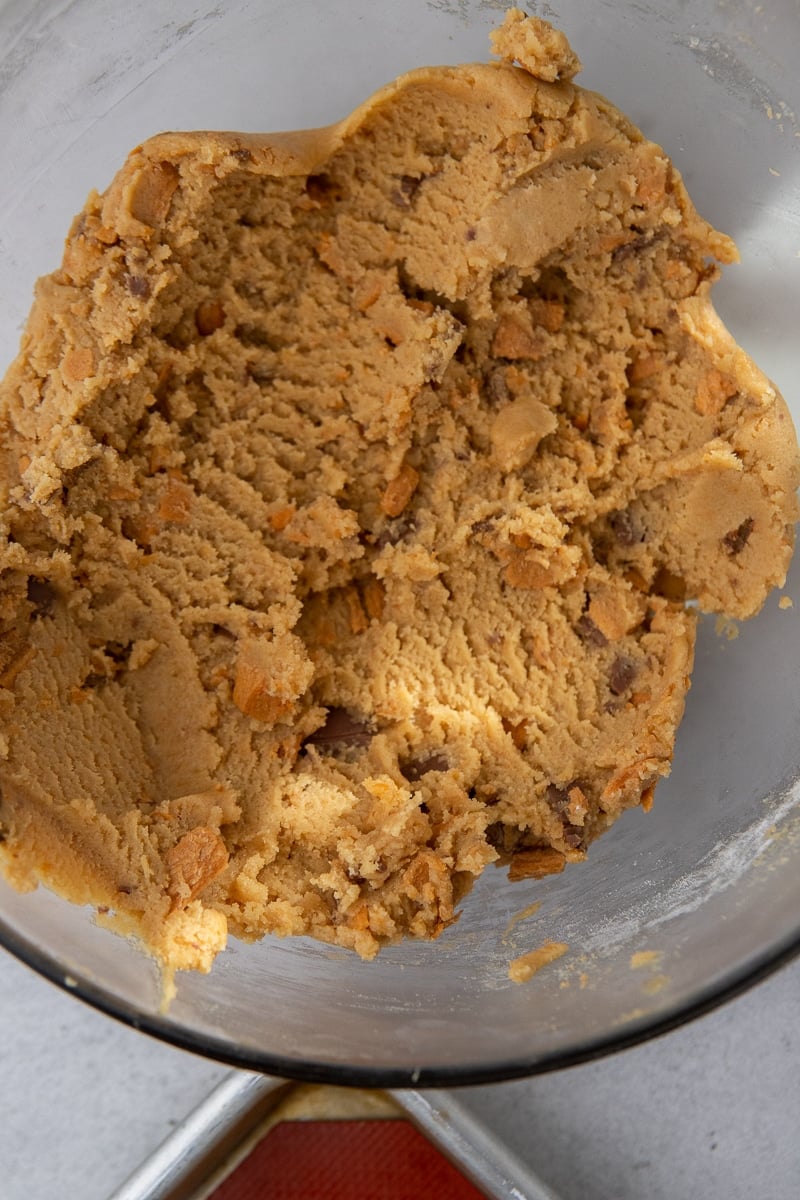Peanut butter butterfinger cookie dough in a bowl
