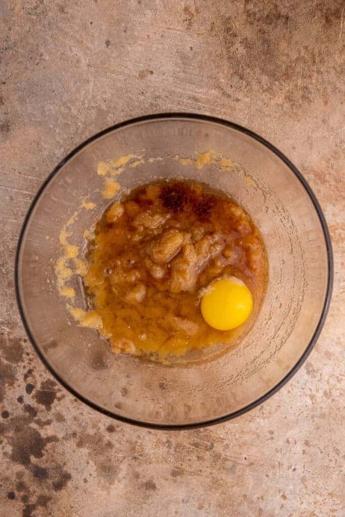 Glossy brownie batter after the egg and vanilla have been whisked into the sugar mixture.