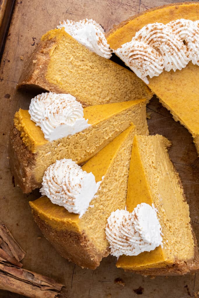 Over head shot of slices of pumpkin cheesecake