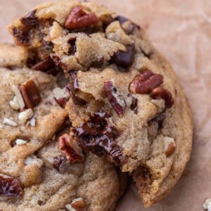 Pecan chocolate chip cookie broken in half