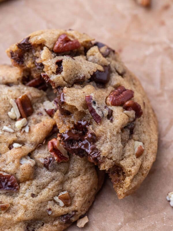 Pecan chocolate chip cookie broken in half