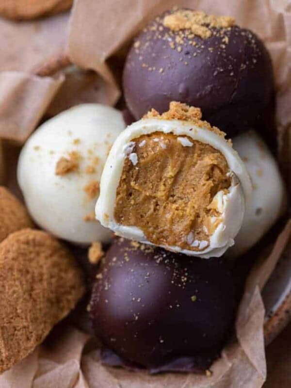 Pumpkin truffle with a bite taken out of it