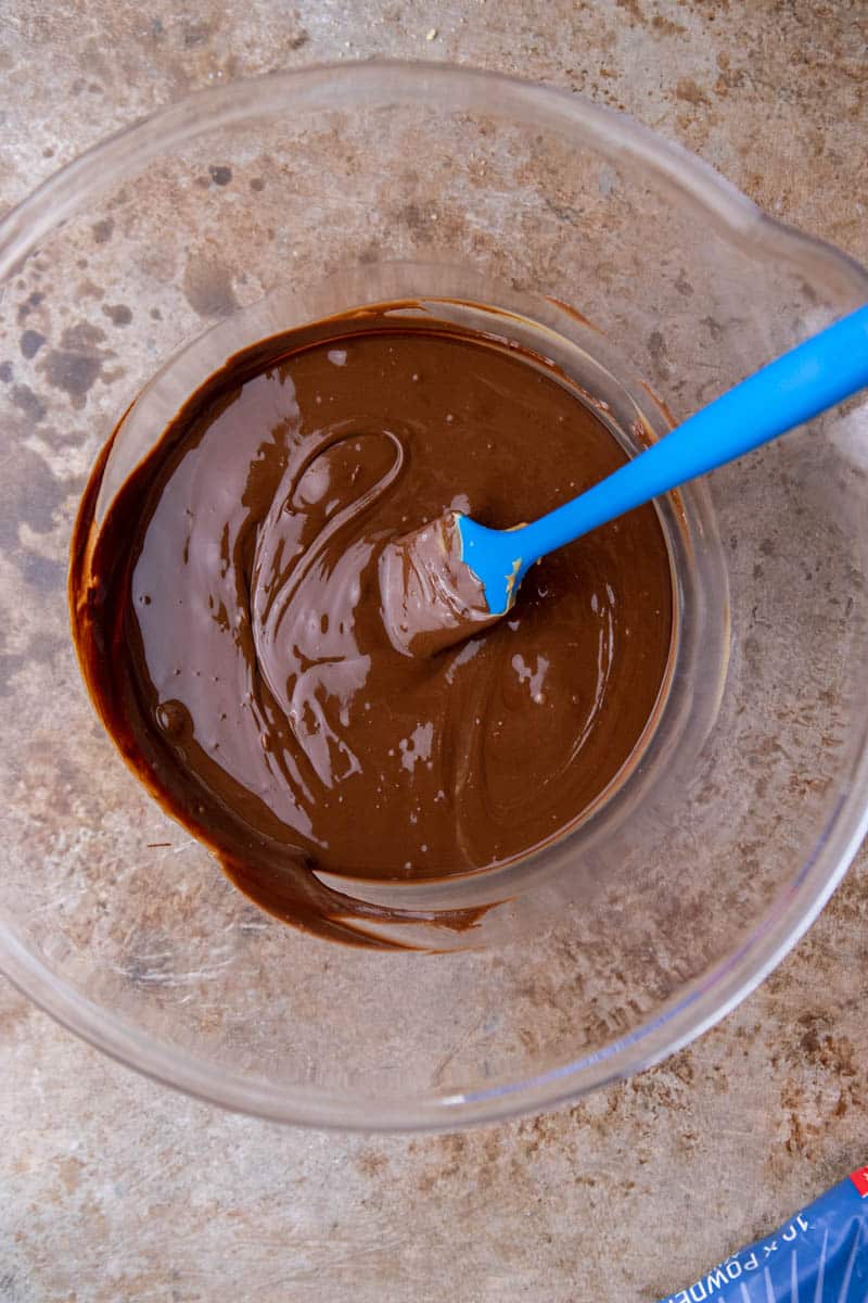 Melted chocolate and peanut butter in a bowl