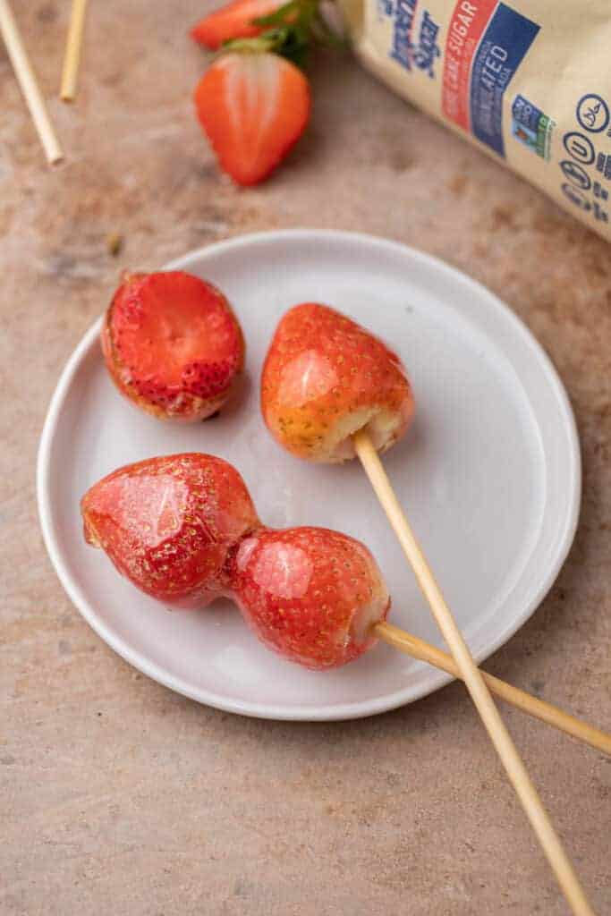 Tanghulu recipe using strawberries on a plate