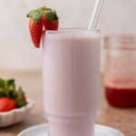 strawberry milk in a ribbed glass