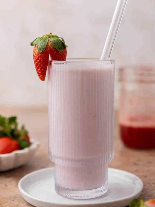strawberry milk in a ribbed glass