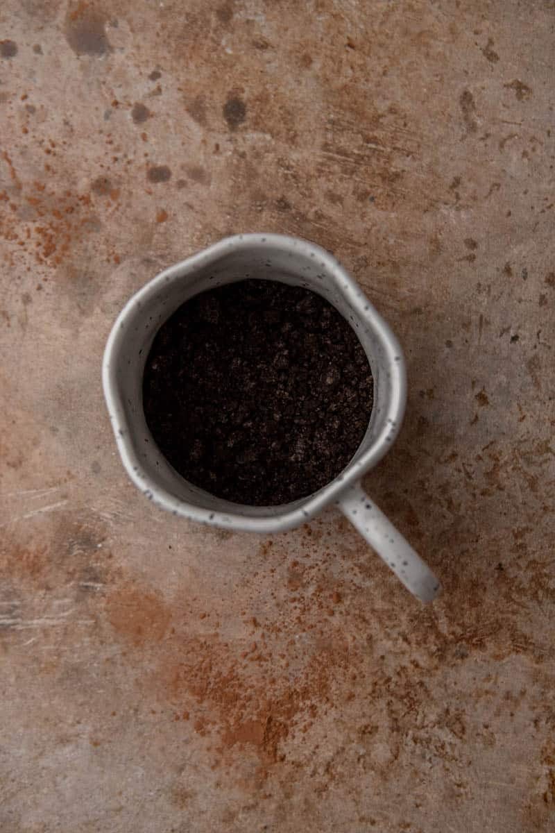 Oreo crumbs in a mug 