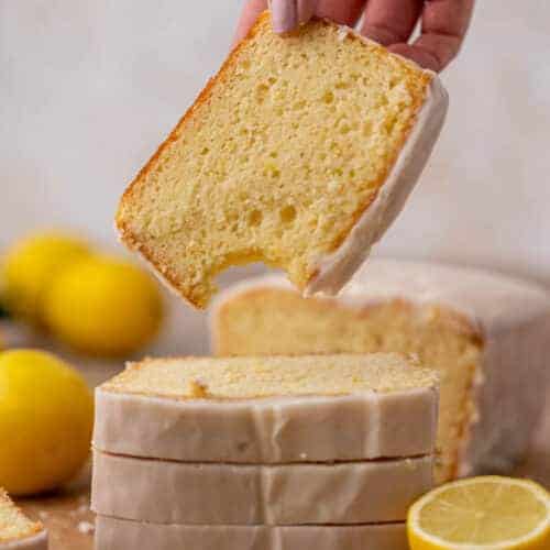 Hand holding Starbucks lemon loaf cake slice