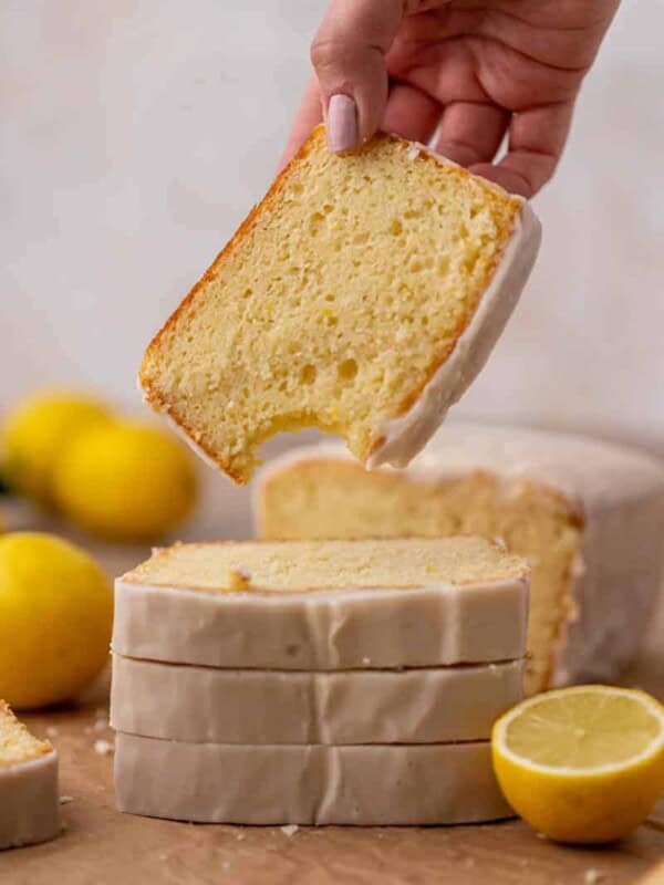 Hand holding Starbucks lemon loaf cake slice